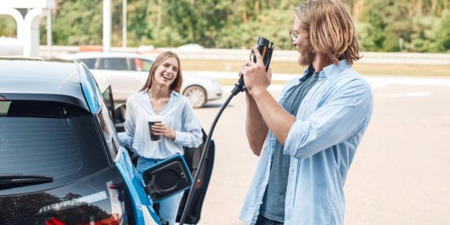 Couple with electric car