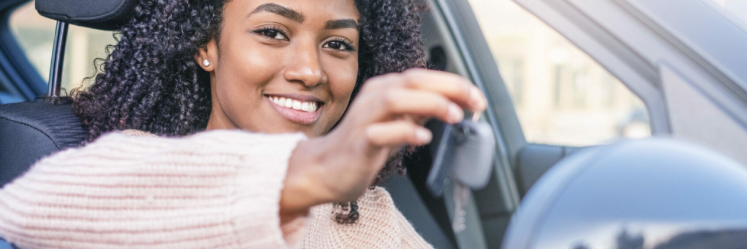 woman holding key arval release business