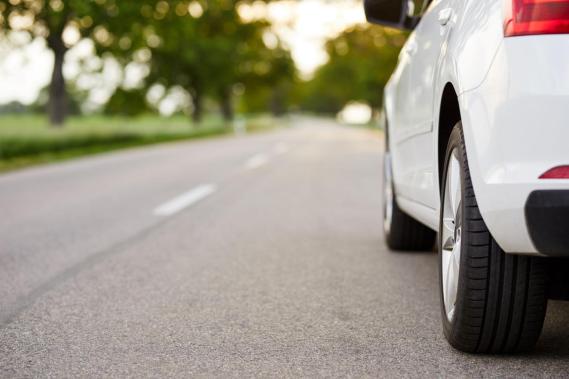 Tyre change mosaic Car driving on a road